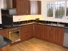 Walnut Fronts with Black Worktops